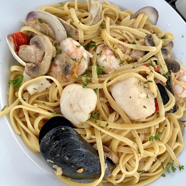 Sapore Italian Cafe's linguine pasta with clams, mussels, shrimp, scallops, mushrooms, and tomatoes.